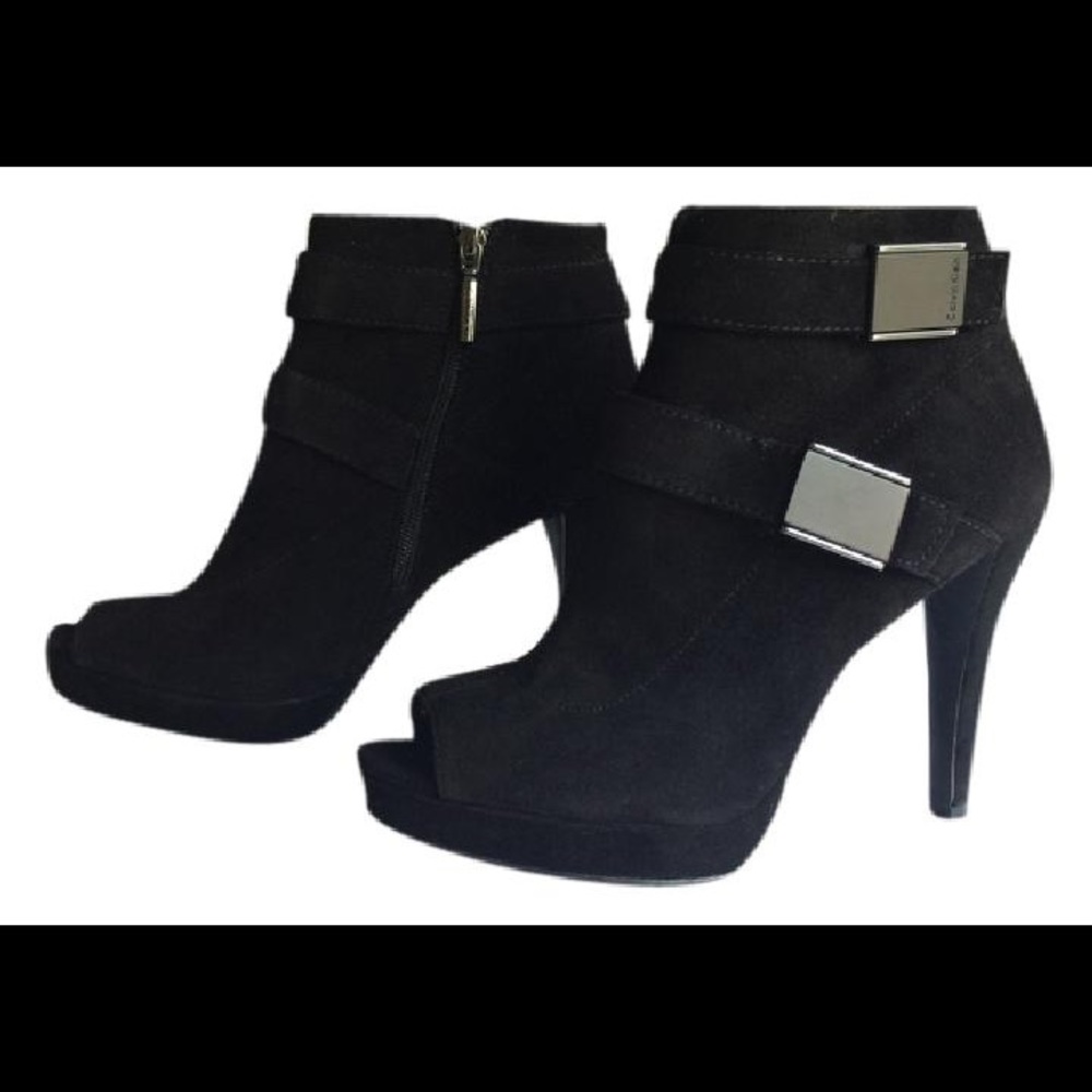Black Calvin Klein boots.
